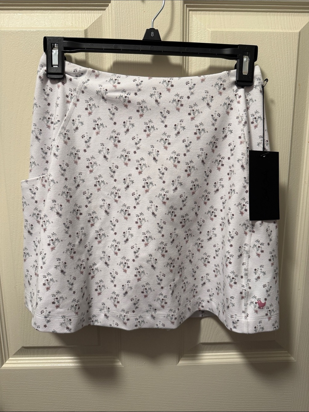 Bad Birdie golf tour skort in petunia junkie